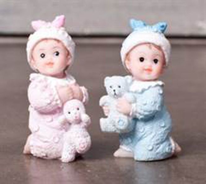 Hovedbilde Bordpynt. Rosa baby sittende, ...