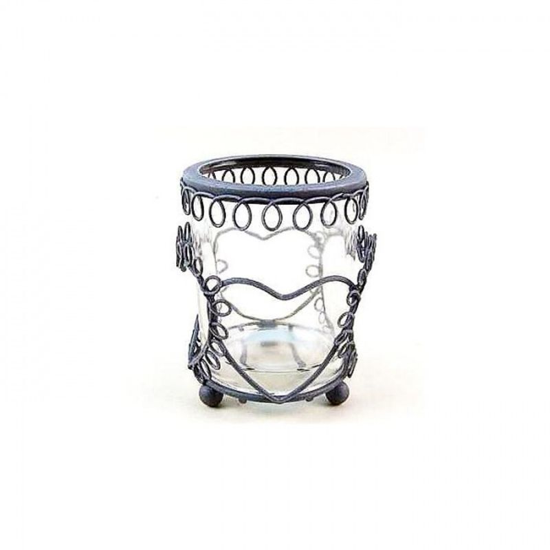 Telysglass med metallhjerte.