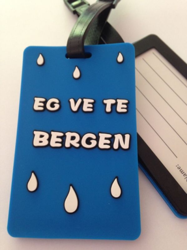 Koffert merkelapp med teksten 